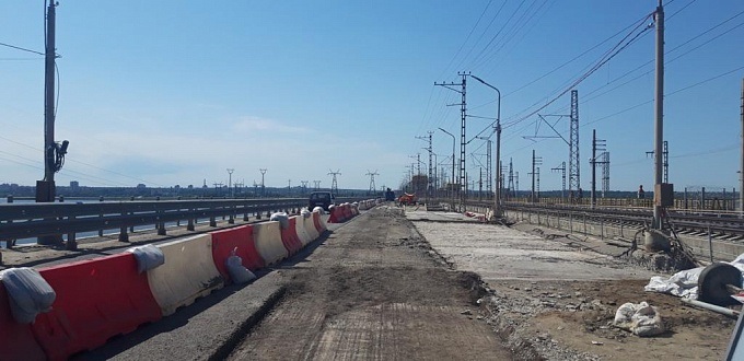 В Волгоградской области приступили к ремонту последнего участка моста Волжской ГЭС В Волгоградской области приступили к ремонту последнего участка моста Волжской ГЭС