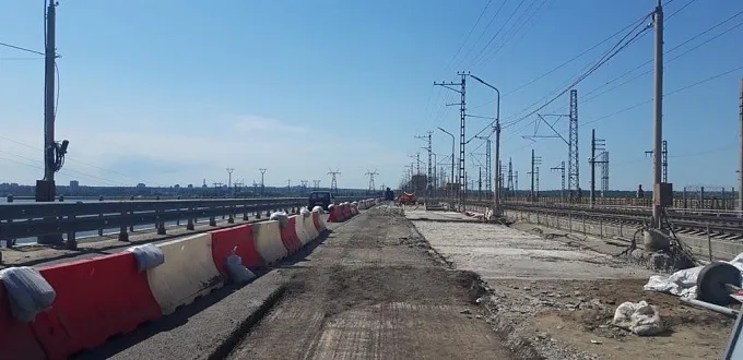 В Волгоградской области приступили к ремонту последнего участка моста Волжской ГЭС В Волгоградской области приступили к ремонту последнего участка моста Волжской ГЭС